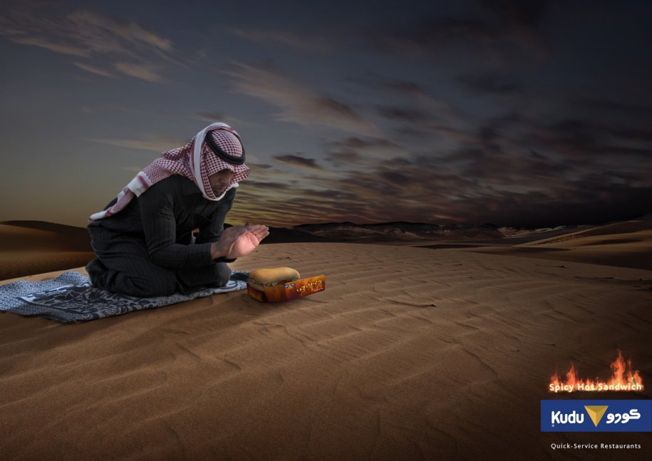 arab advertising is often unafraid to play to stereotypes here a keffiyeh wearing desert nomad warms his hands at night over a spicy chicken sandwich from kudu a chain restaurant